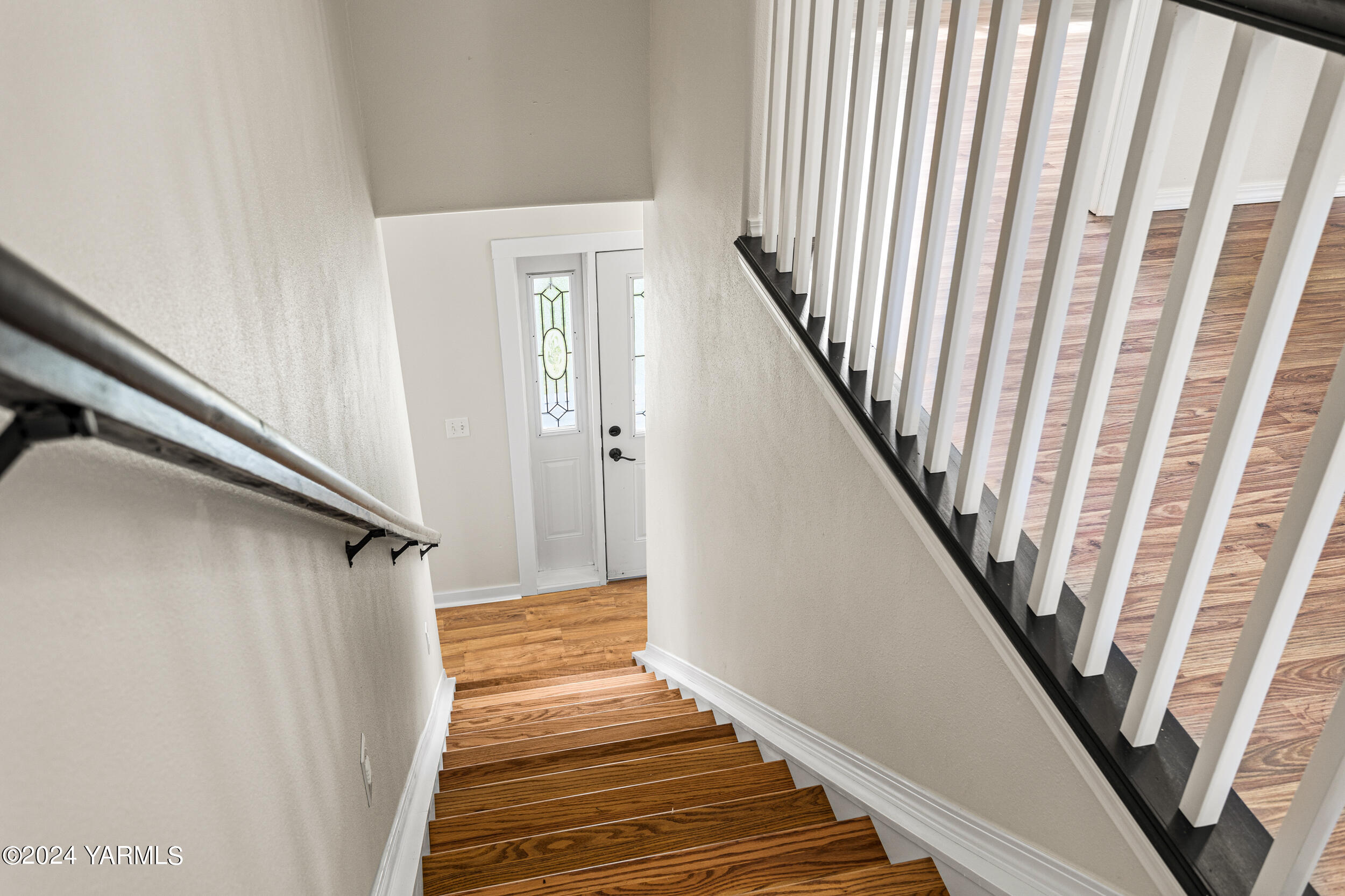 633 Hancock Road Cowiche, WA 98923 - Photo 32 of 53 a view of staircase with wooden floor and stairs