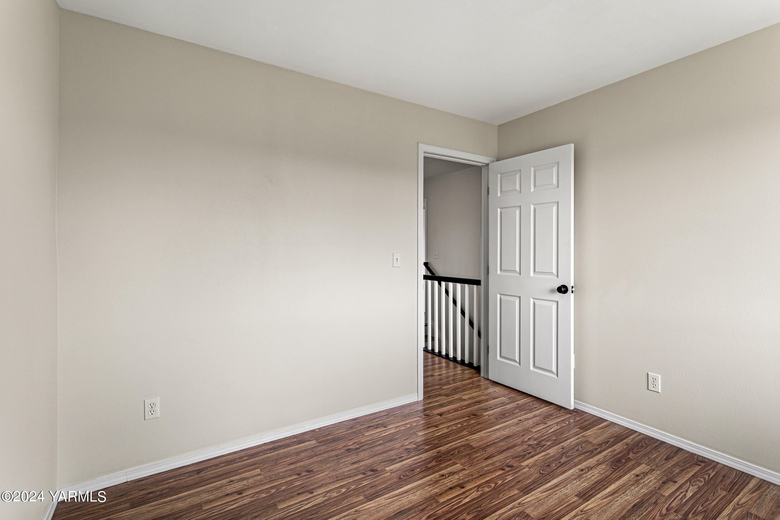 633 Hancock Road Cowiche, WA 98923 - Photo 41 of 53 a view of a hallway with wooden floor