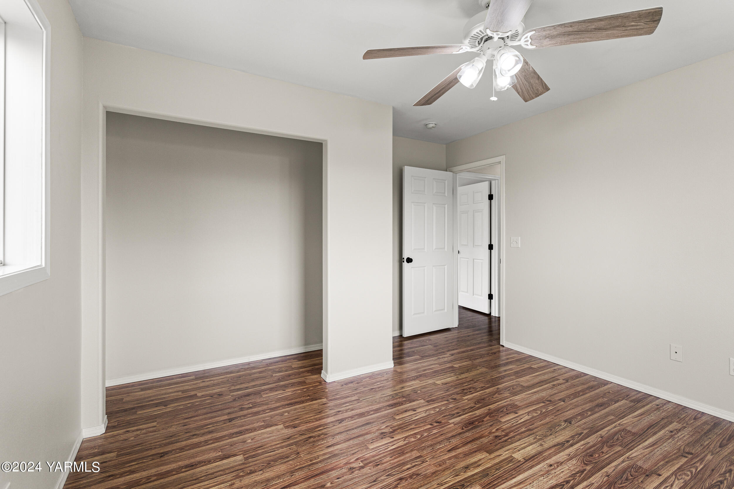 633 Hancock Road Cowiche, WA 98923 - Photo 45 of 53 a view of an empty room with wooden floor