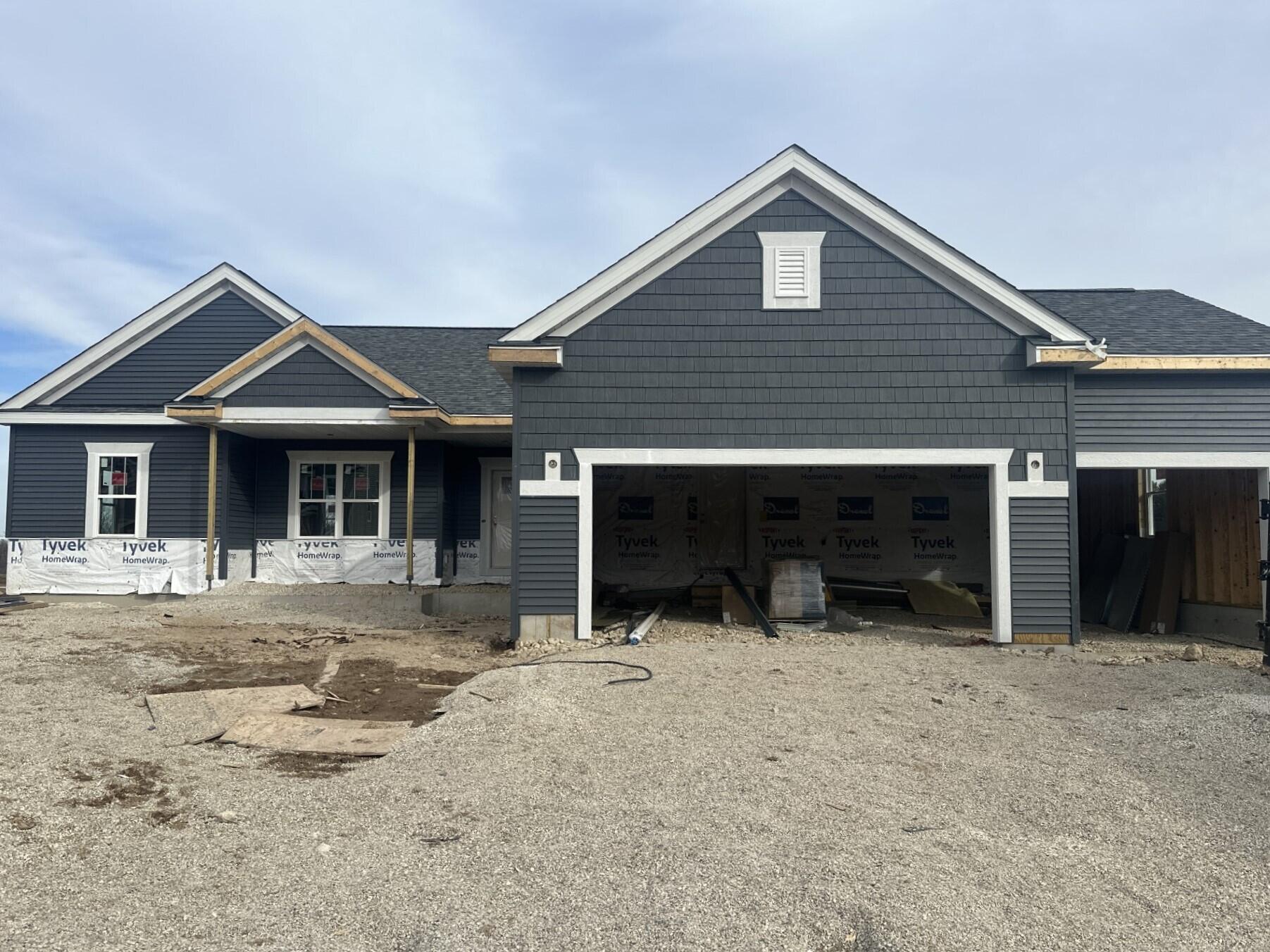 638 Hawks Ridge Road Grafton, WI 53024 - Photo 2 of 8 Siding Underway!