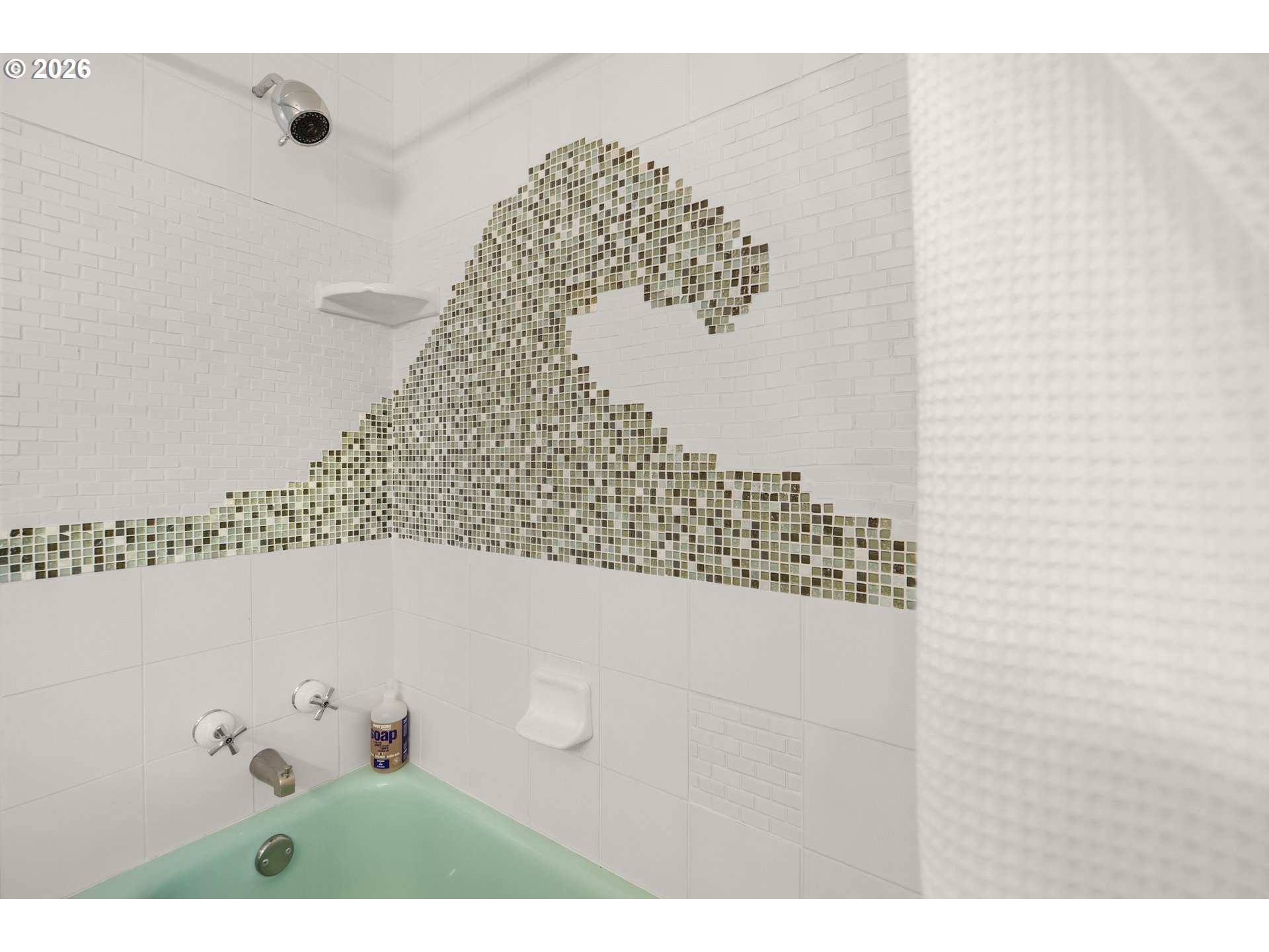 1210 South Columbia Street Seaside, OR 97138 - Photo 25 of 40 a bathroom with a bathtub and shower