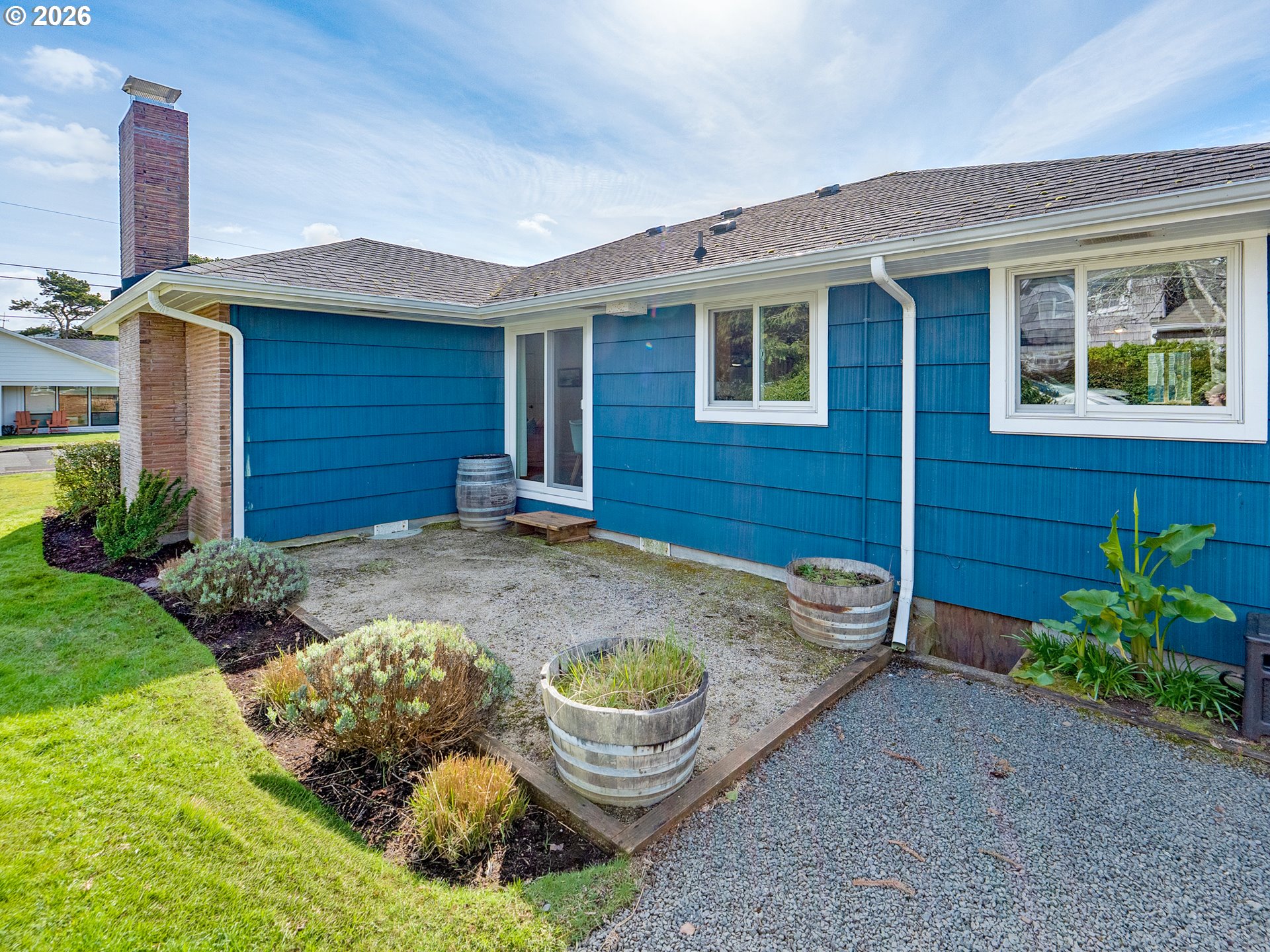 1210 South Columbia Street Seaside, OR 97138 - Photo 31 of 40 a house view with a backyard space