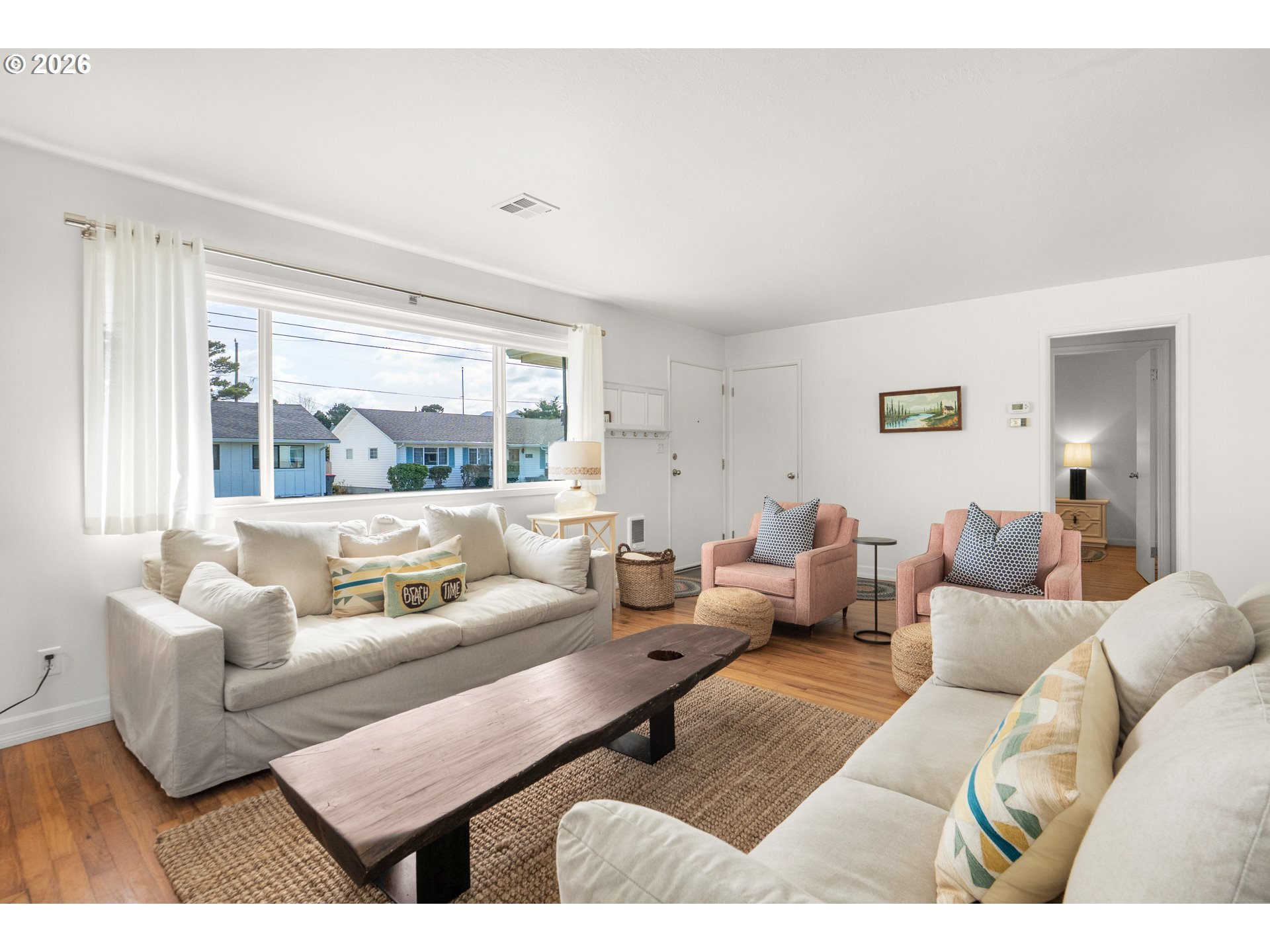 1210 South Columbia Street Seaside, OR 97138 - Photo 5 of 40 a living room with furniture and a large window