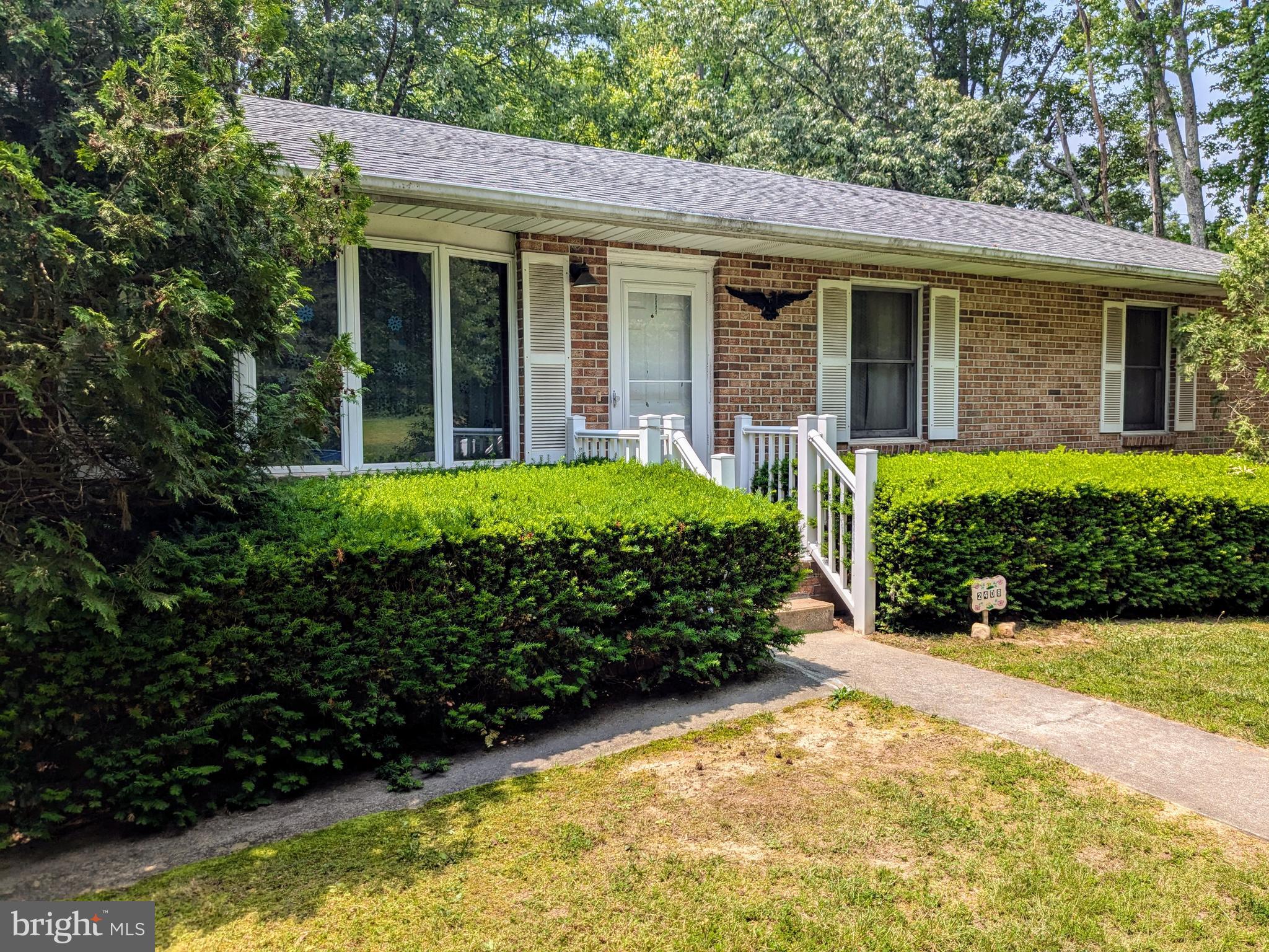 2408 Old Mountain Road Joppa, MD 21085 - Photo 1 of 25 a view of a backyard with garden
