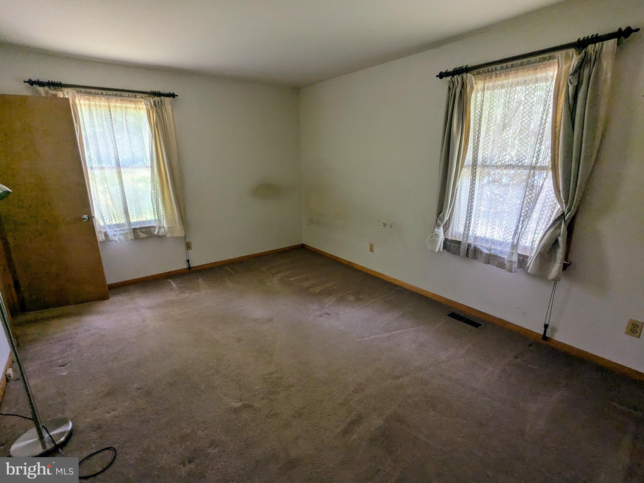 2408 Old Mountain Road Joppa, MD 21085 - Photo 13 of 25 an empty room with windows