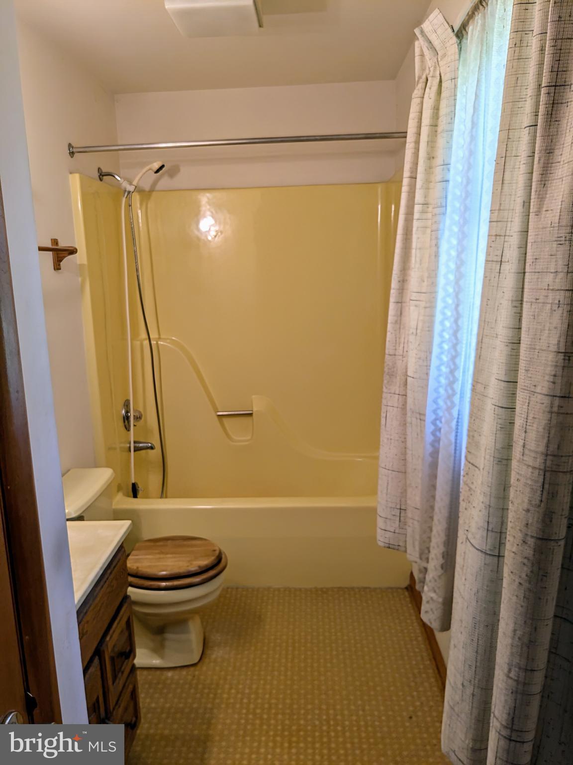 2408 Old Mountain Road Joppa, MD 21085 - Photo 15 of 25 a bathroom with a sink and a shower