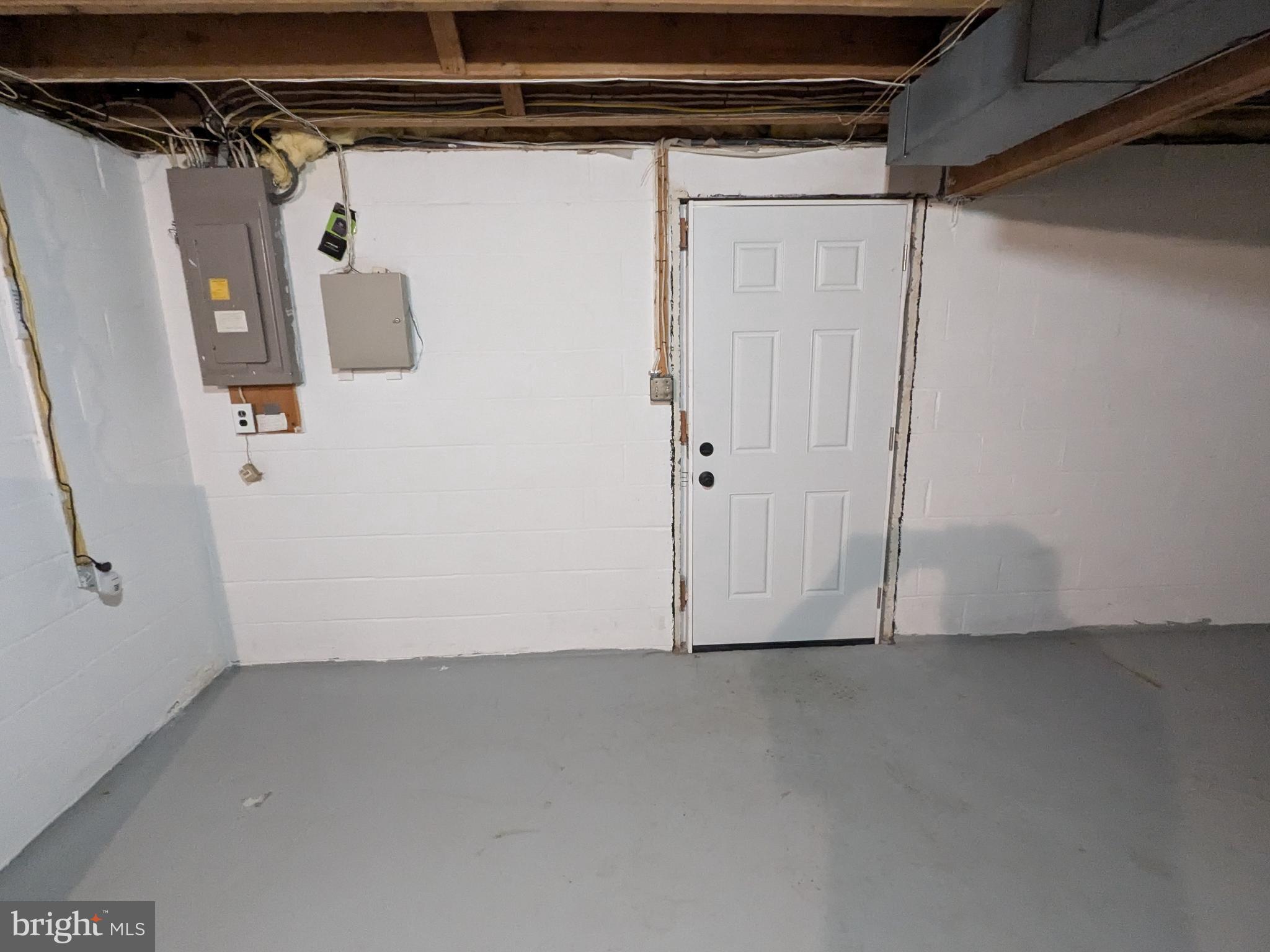 2408 Old Mountain Road Joppa, MD 21085 - Photo 19 of 25 a view of a room with racks on the wall