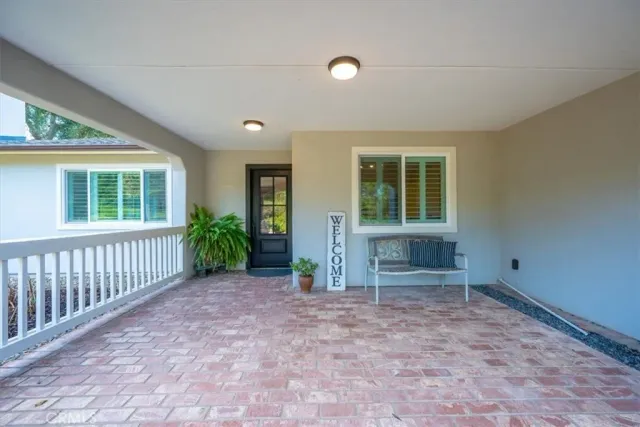 a workspace with furniture and a window