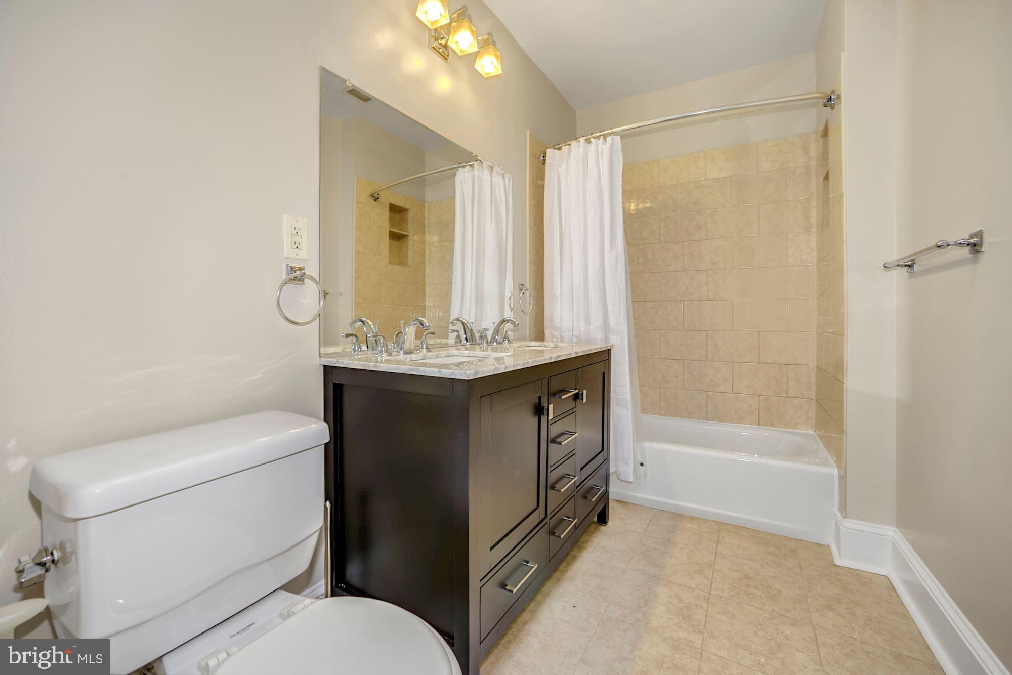 542 23rd Place Northeast Washington, DC 20002 - Photo 13 of 21 Renovated Bathroom