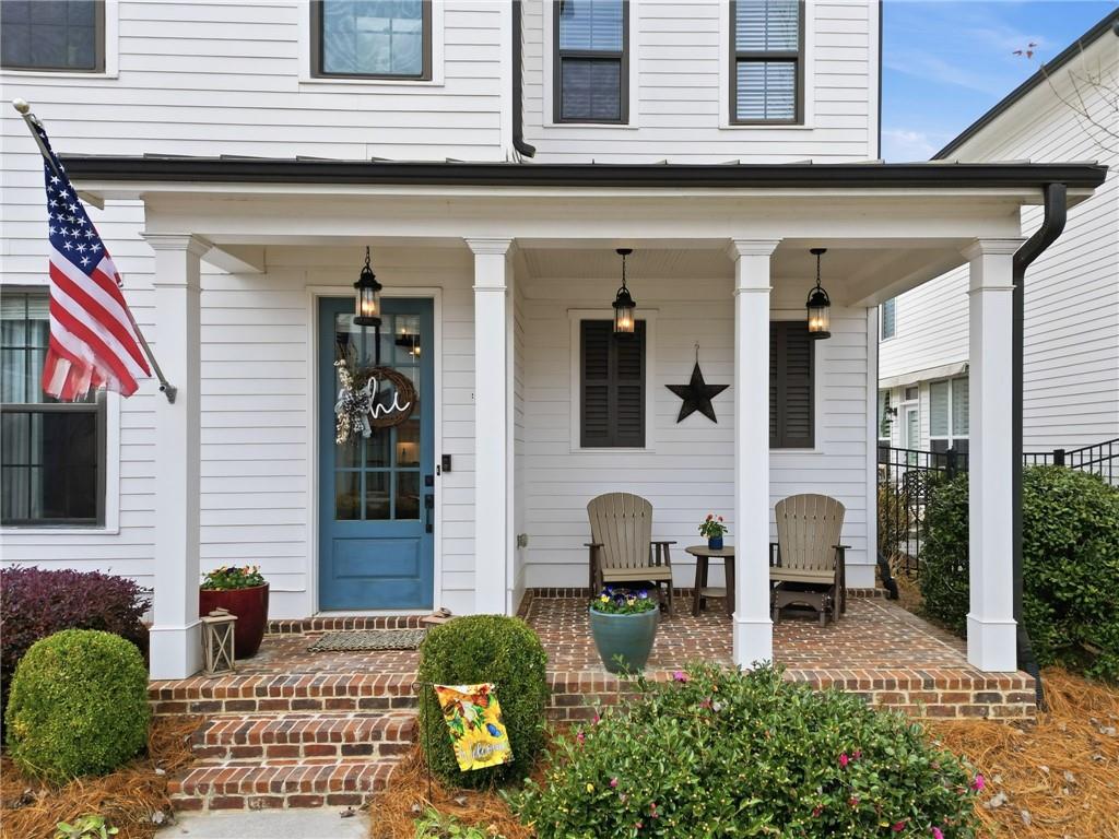 112 Idylwilde Way Canton, GA 30115 - Photo 2 of 46 a front view of a house with patio