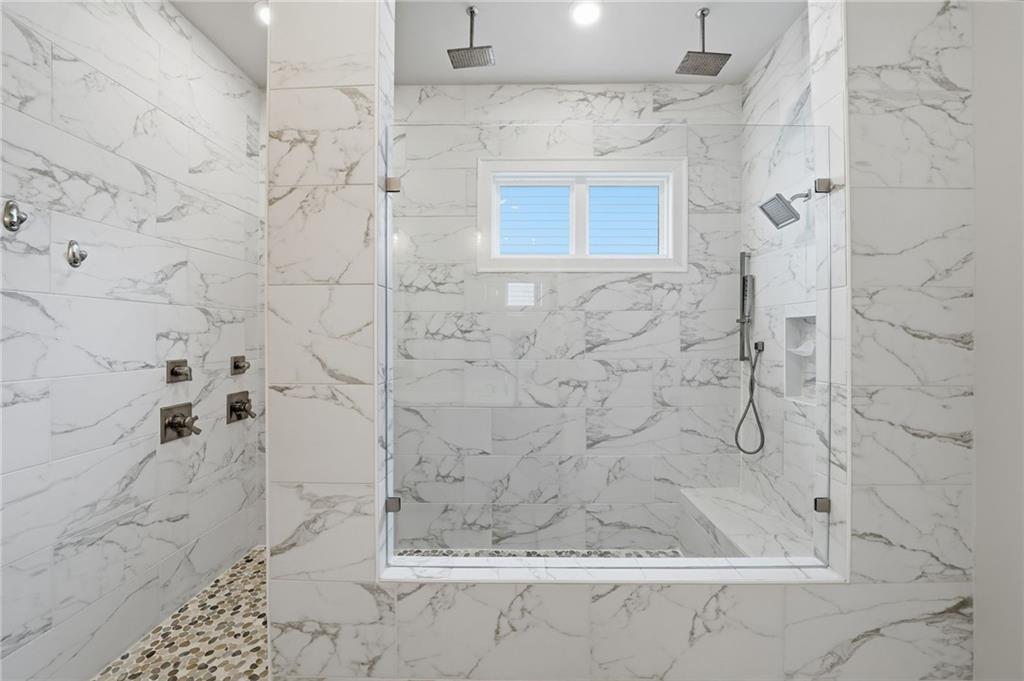 112 Idylwilde Way Canton, GA 30115 - Photo 23 of 46 a bathroom with a shower