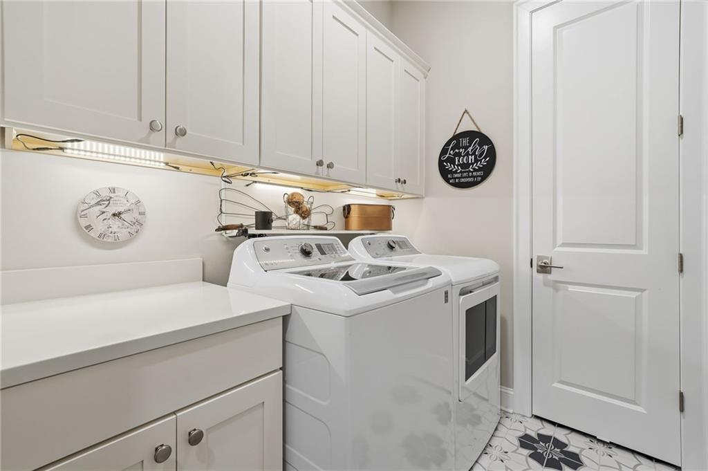 112 Idylwilde Way Canton, GA 30115 - Photo 25 of 46 a utility room with dryer and washer