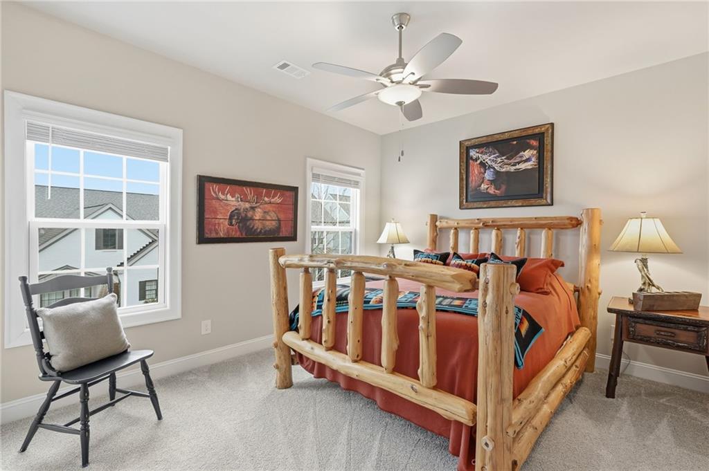 112 Idylwilde Way Canton, GA 30115 - Photo 30 of 46 a bedroom with furniture and a window