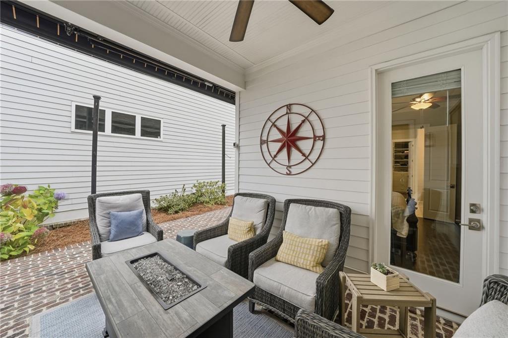 112 Idylwilde Way Canton, GA 30115 - Photo 34 of 46 a front view of a house with outdoor seating