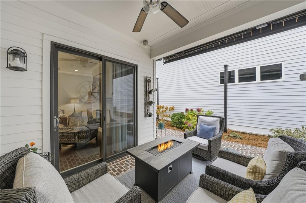 112 Idylwilde Way Canton, GA 30115 - Photo 35 of 46 a living room with furniture and a table