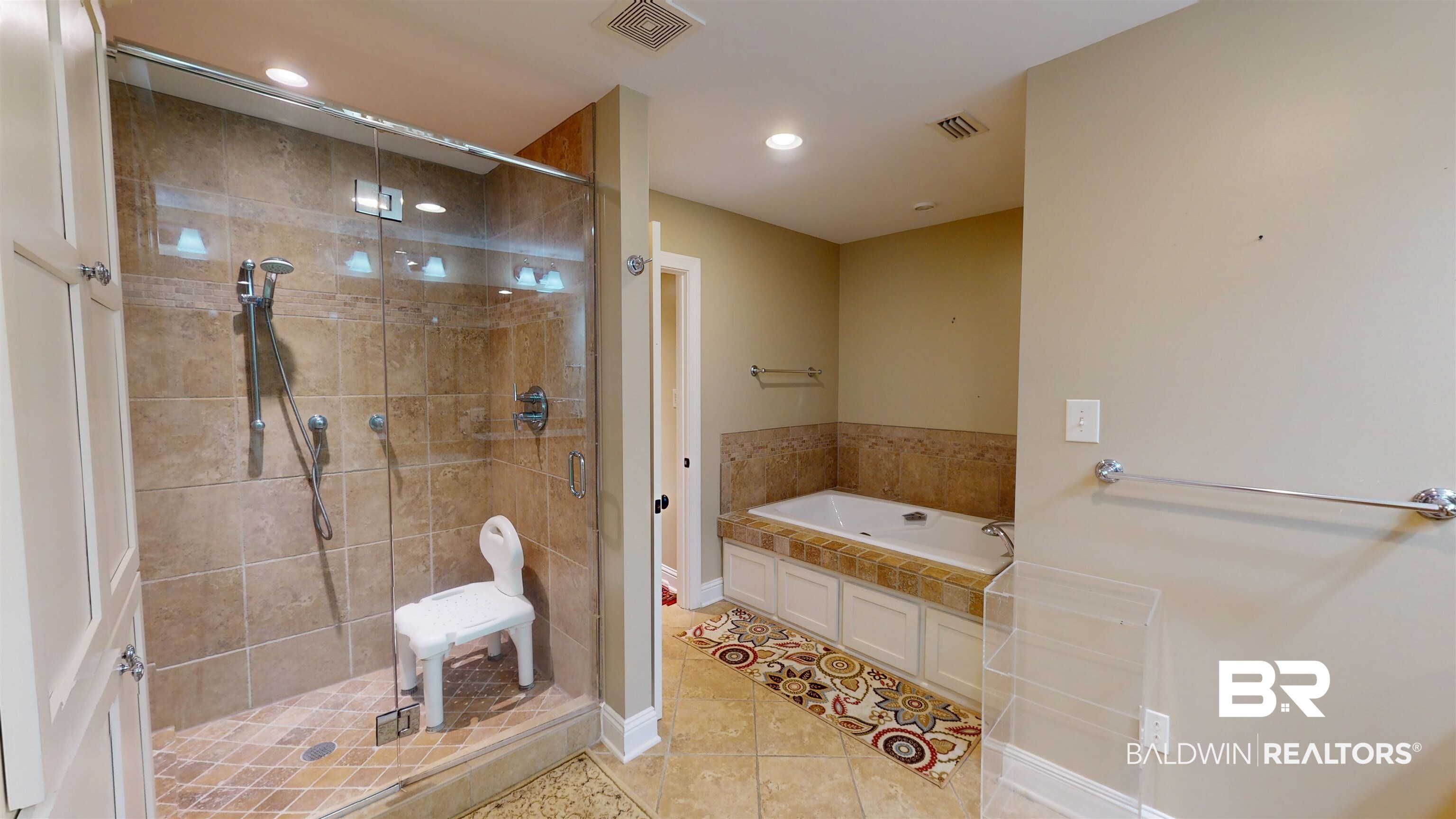 2404 Spring Hill Avenue, Unit 115 Mobile, AL 36607 - Photo 19 of 38 Bathroom featuring tile patterned floors and independent shower and bath