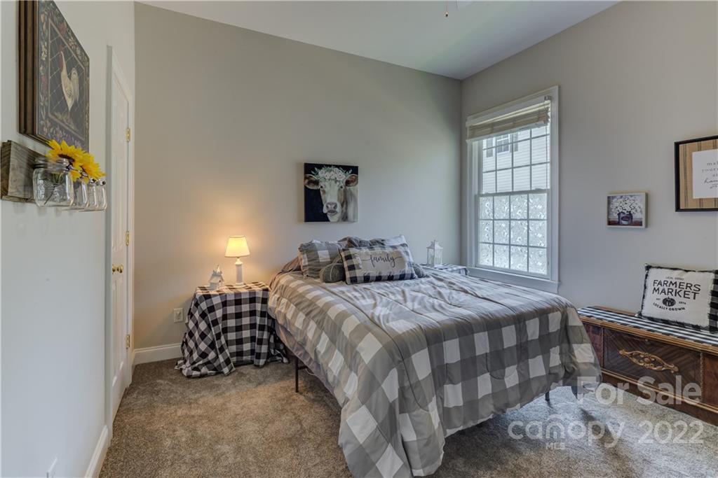 783 Julia Street Fort Mill, SC 29708 - Photo 29 of 48 a bedroom with a bed and a window