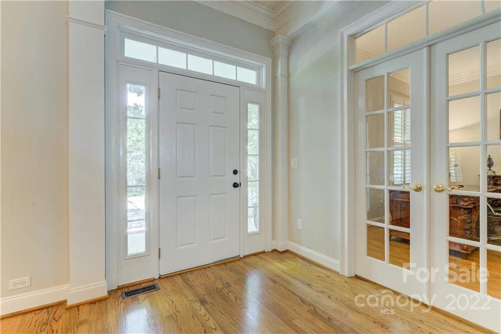 783 Julia Street Fort Mill, SC 29708 - Photo 5 of 48 an empty room with wooden floor and windows
