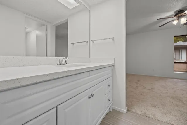 a bathroom with a bath tub and shower