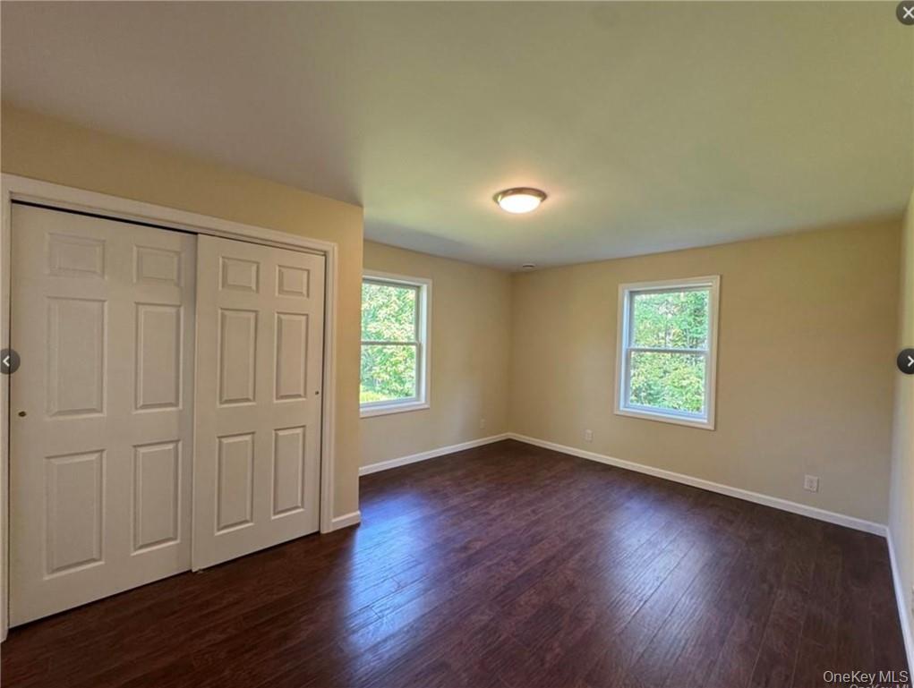 30 Daly Road Middletown, NY 10940 - Photo 21 of 24 a view of an empty room with wooden floor and a window