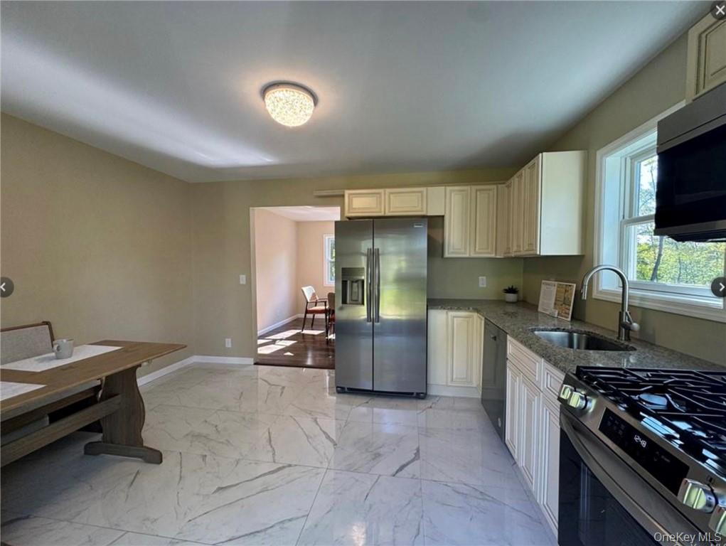 30 Daly Road Middletown, NY 10940 - Photo 6 of 24 a kitchen with refrigerator and cabinets