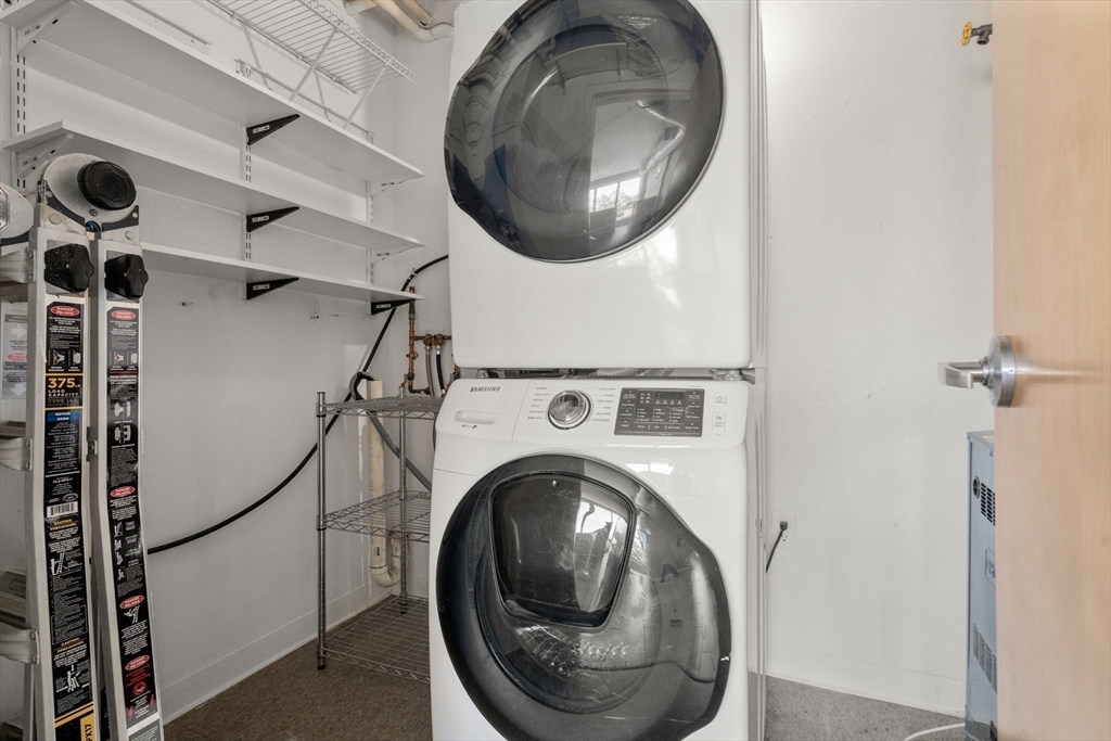 156 Porter Street, Unit 421 Boston, MA 02128 - Photo 11 of 29 a utility room with dryer and washer