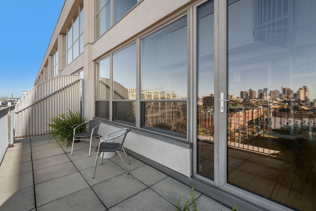 156 Porter Street, Unit 421 Boston, MA 02128 - Photo 17 of 29 a view of balcony with potted plants