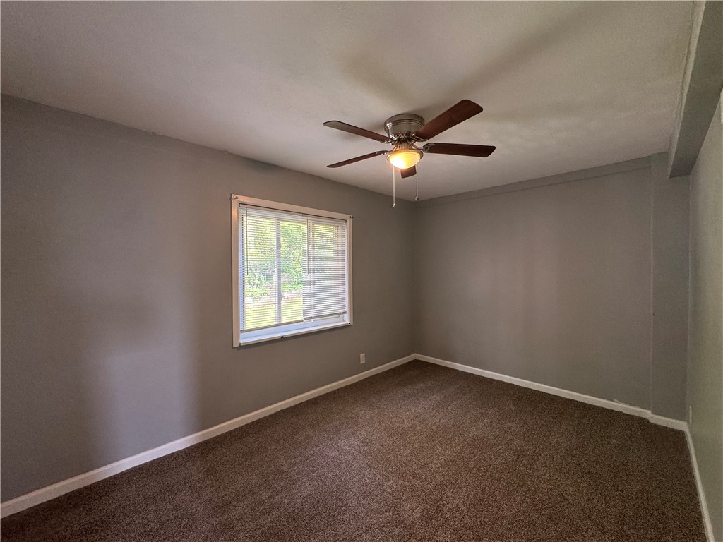 2358 South Patterson Boulevard, Unit 6 Kettering, OH 45409 - Photo 8 of 9 This airy bedroom offers a comfortable retreat with ample natural light.