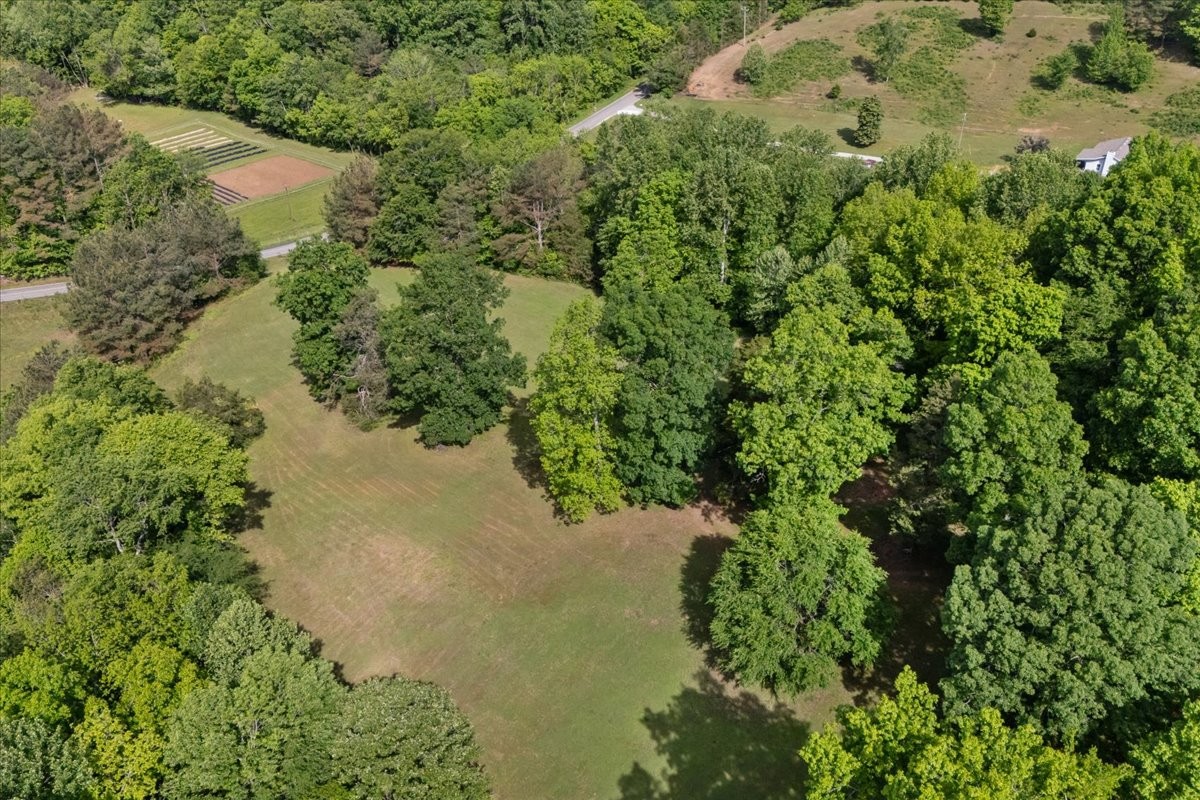0 Poplar Grove Road McEwen, TN 37101 - Photo 25 of 51 an aerial view of residential house with outdoor space and trees all around