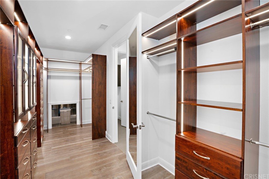 11907 Ancona Way Porter Ranch, CA 91326 - Photo 34 of 67 a view of front door with hallway and stairs
