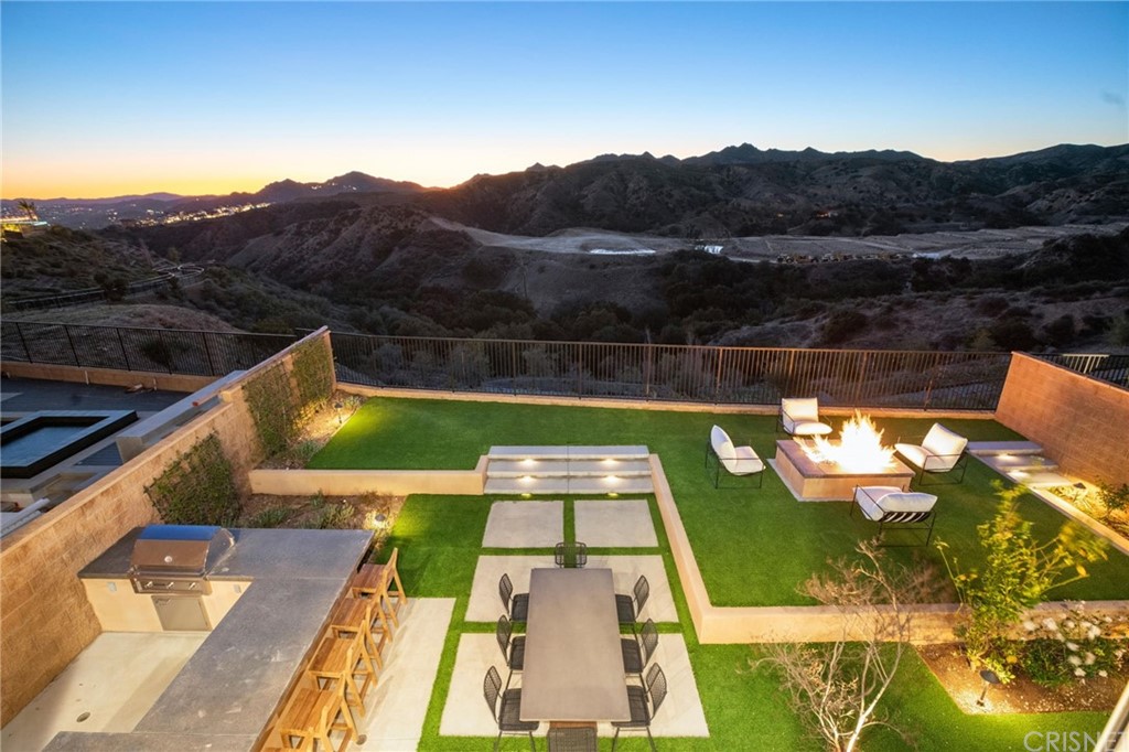 11907 Ancona Way Porter Ranch, CA 91326 - Photo 38 of 67 a view of swimming pool with a patio