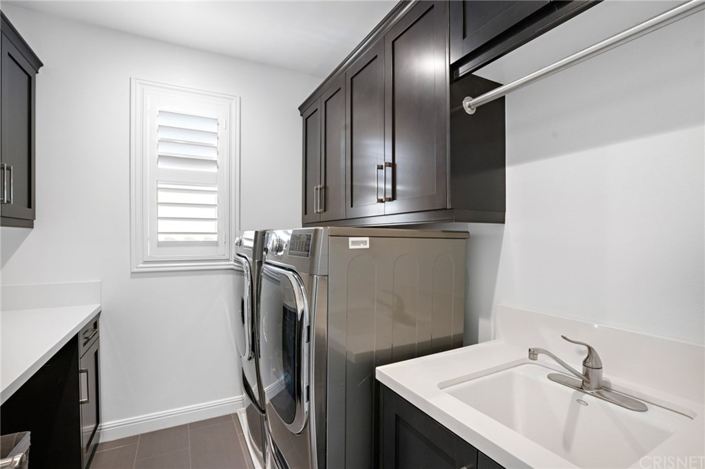 11907 Ancona Way Porter Ranch, CA 91326 - Photo 39 of 67 Laundry Room.