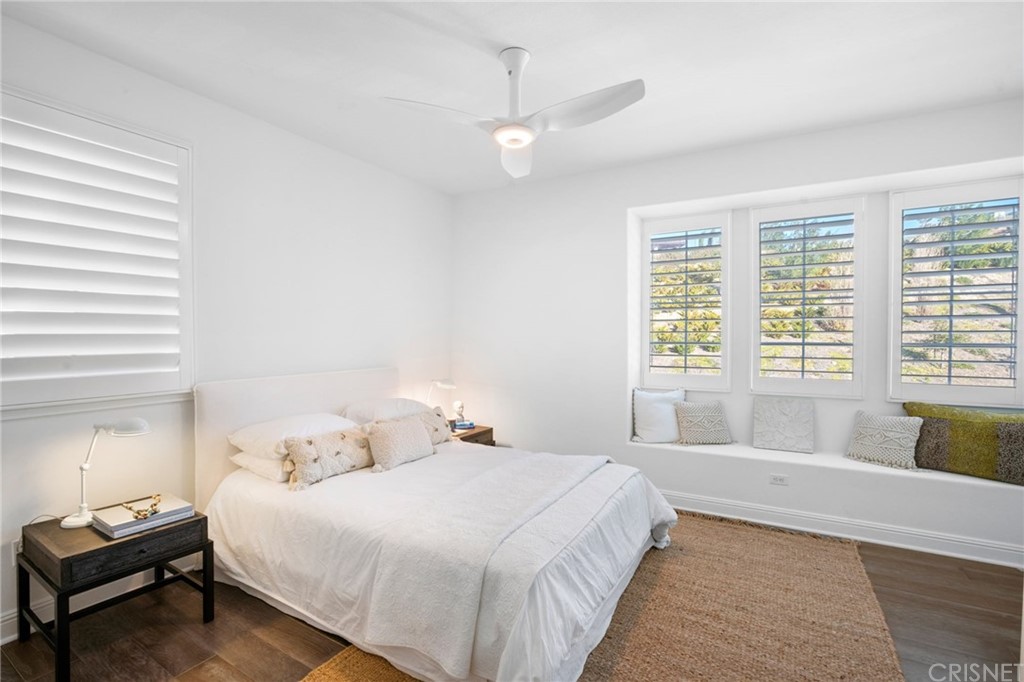 11907 Ancona Way Porter Ranch, CA 91326 - Photo 43 of 67 a bedroom with a bed and a window