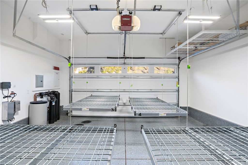 11907 Ancona Way Porter Ranch, CA 91326 - Photo 57 of 67 a stove top oven sitting inside of a kitchen