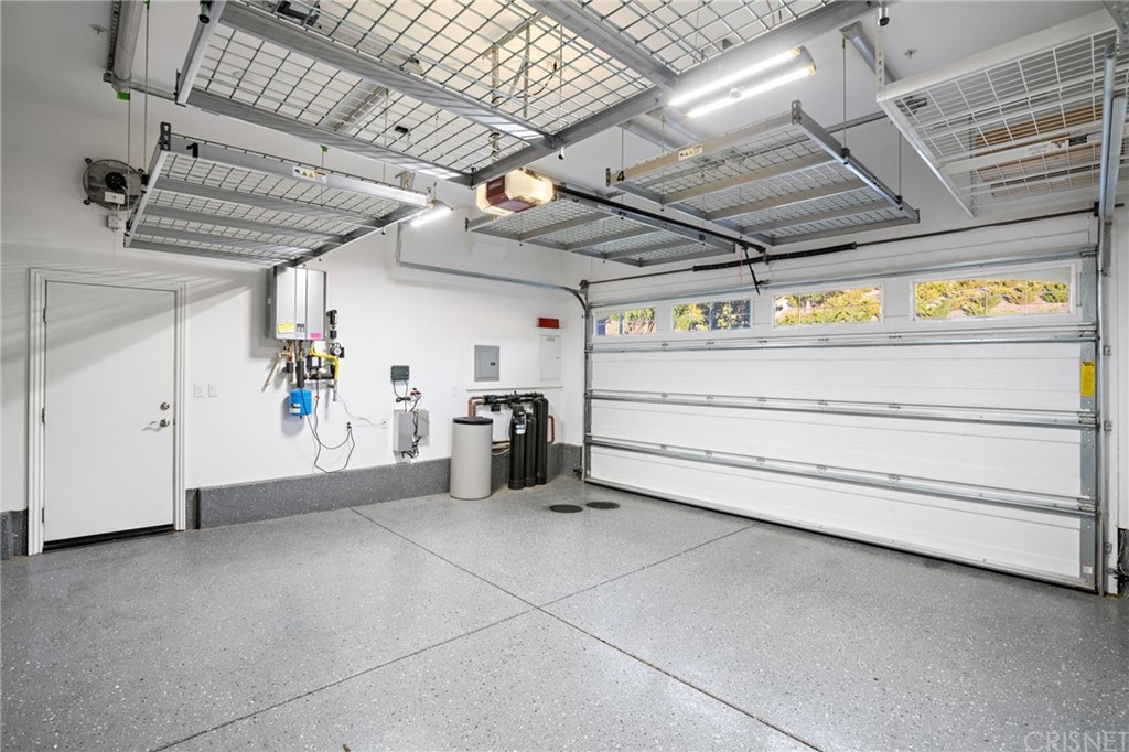 11907 Ancona Way Porter Ranch, CA 91326 - Photo 58 of 67 a view of a garage