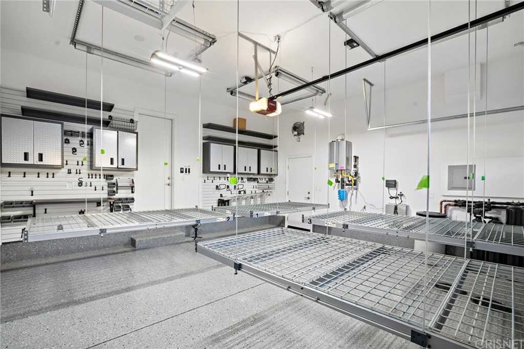 11907 Ancona Way Porter Ranch, CA 91326 - Photo 62 of 67 a living room with lots of furniture and a rug