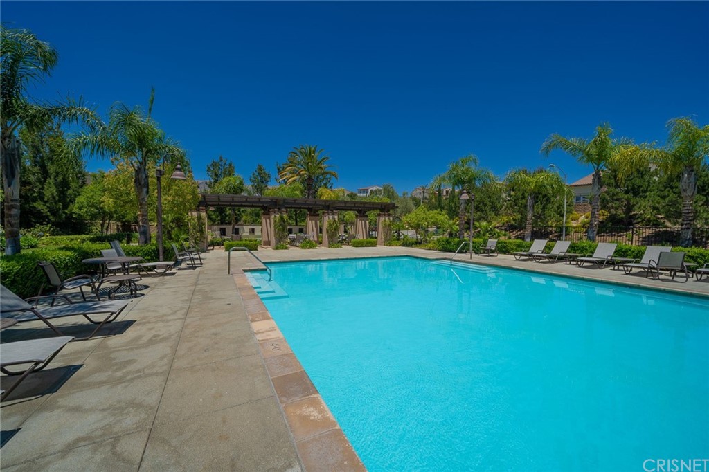 11907 Ancona Way Porter Ranch, CA 91326 - Photo 66 of 67 a view of swimming pool with outdoor seating and yard