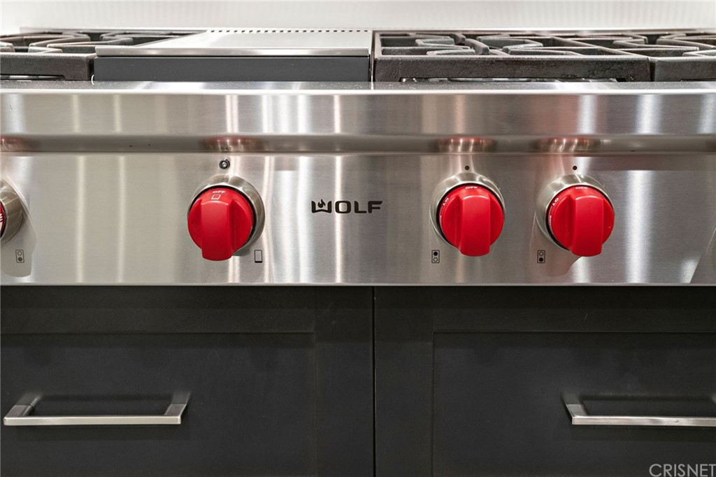11907 Ancona Way Porter Ranch, CA 91326 - Photo 7 of 67 48" Wolf 6 burner cooktop w/griddle.