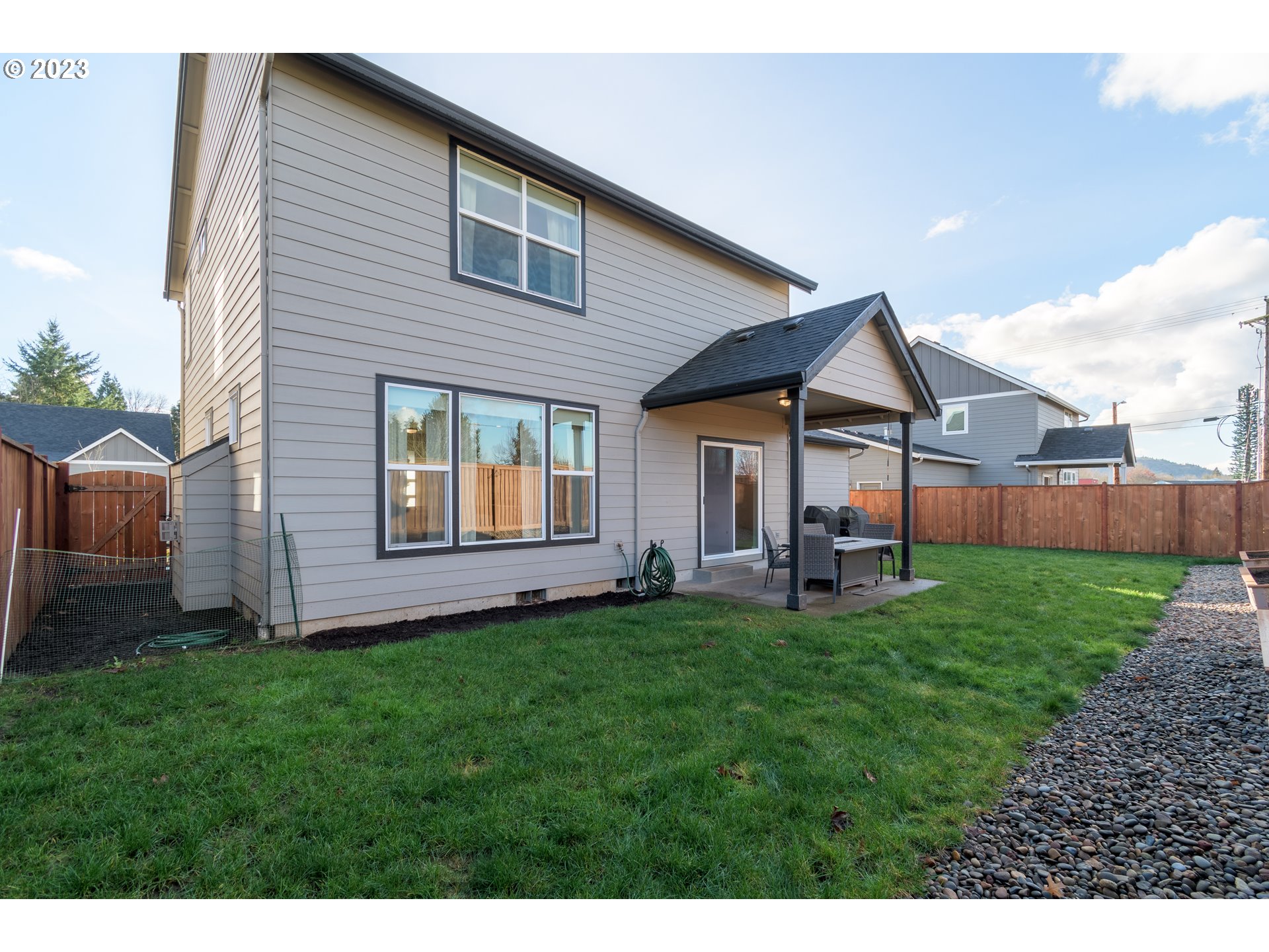 4250 Horace Street Springfield, OR 97478 - Photo 34 of 41 a view of a house with a yard and sitting area