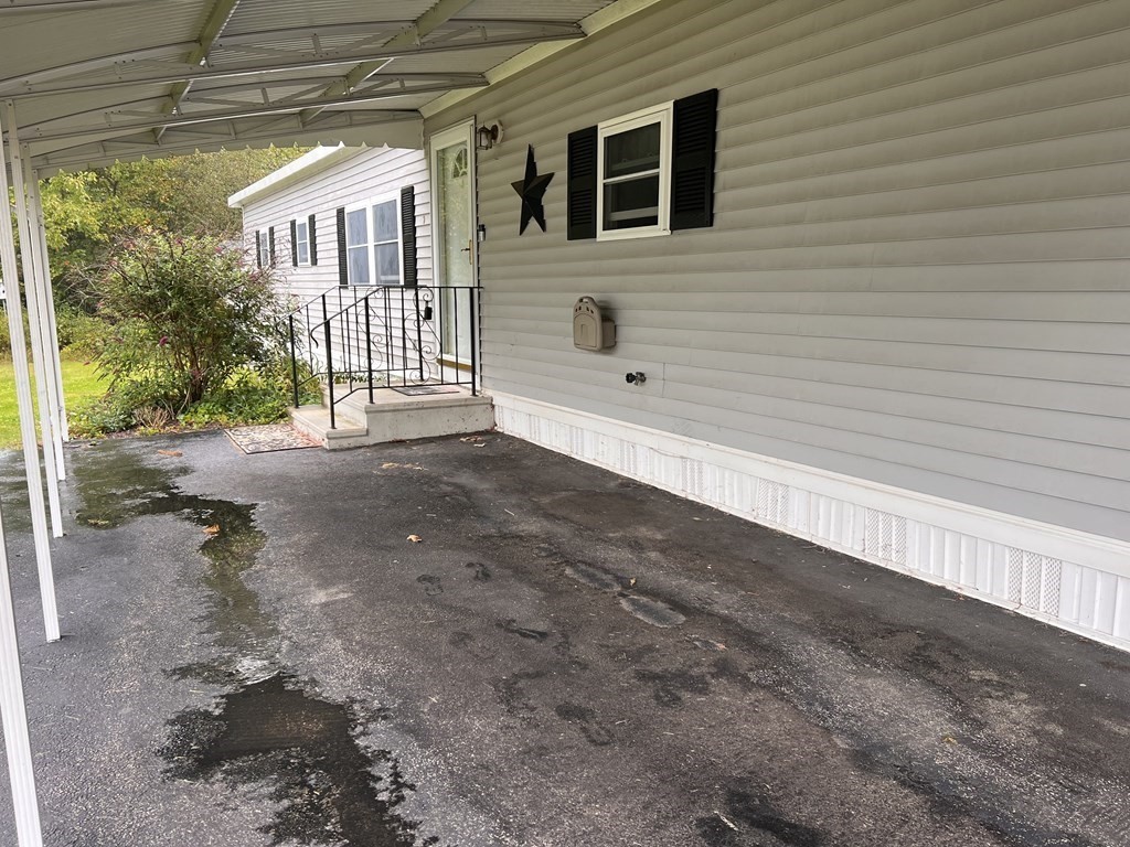 25 St James Circle Hudson, MA 01749 - Photo 14 of 15 a view of a house with a street