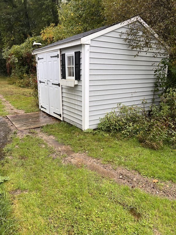 25 St James Circle Hudson, MA 01749 - Photo 15 of 15 a view of a back yard of the house