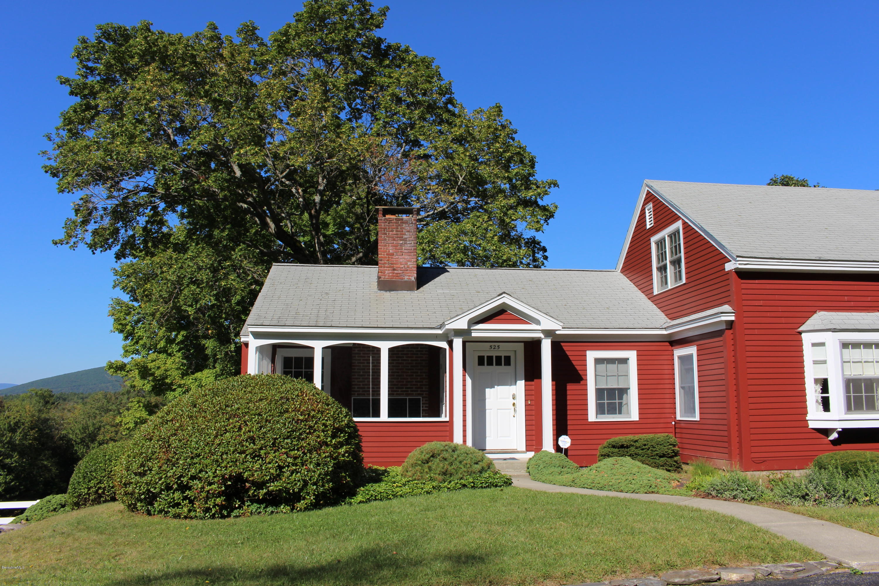 525 E Road Clarksburg, MA 01247 - Photo 2 of 24 a front view of a house with a yard