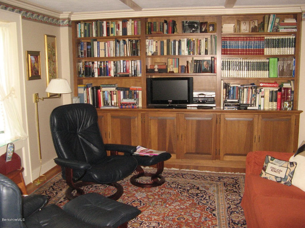 525 E Road Clarksburg, MA 01247 - Photo 12 of 24 a workspace with furniture bookshelf and a window