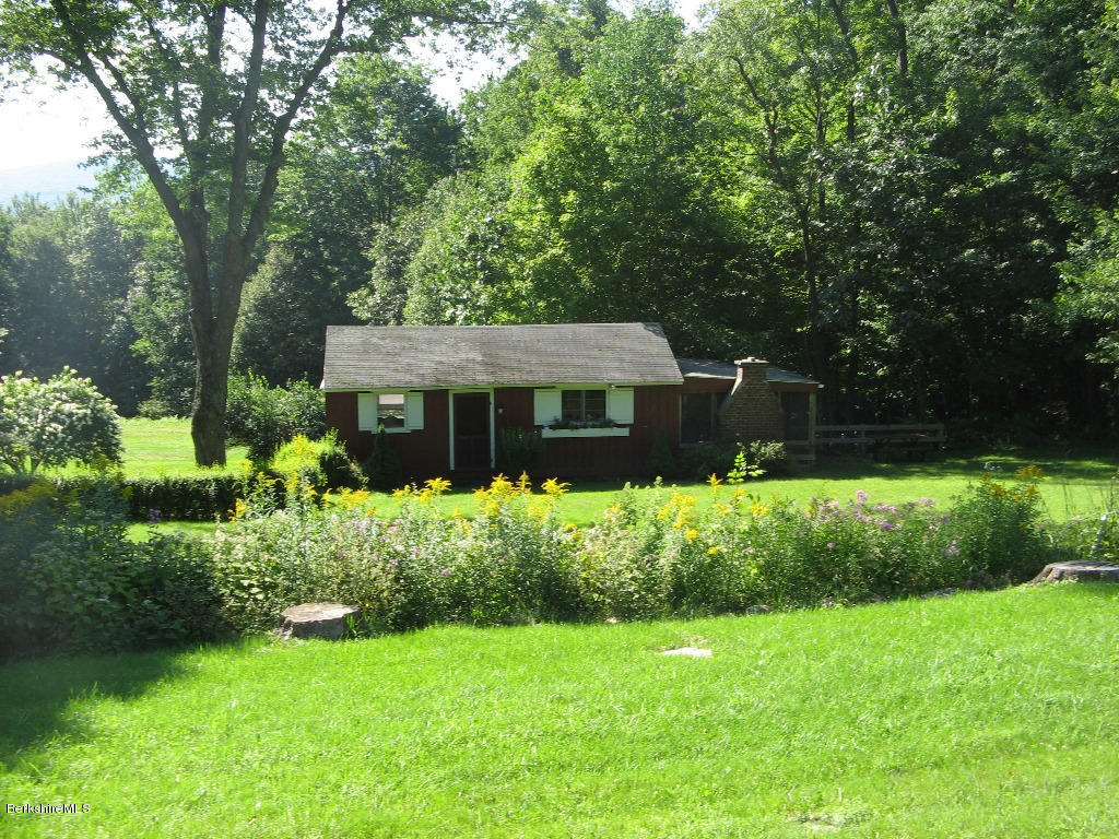 525 E Road Clarksburg, MA 01247 - Photo 22 of 24 a front view of a house with a yard
