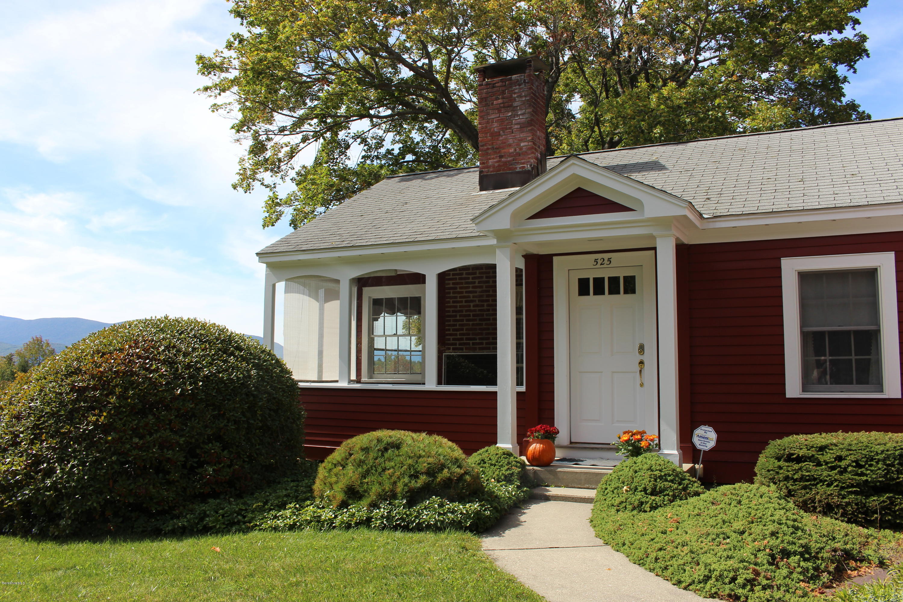 525 E Road Clarksburg, MA 01247 - Photo 24 of 24 a front view of a house with a garden