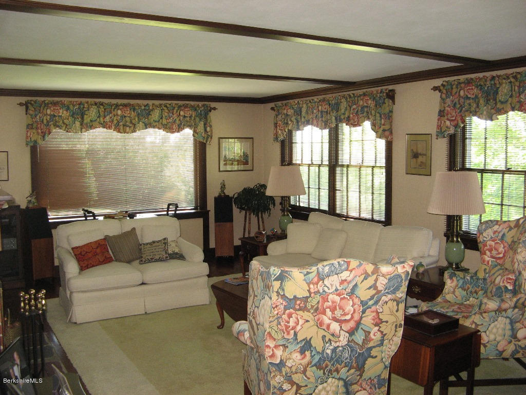 525 E Road Clarksburg, MA 01247 - Photo 9 of 24 a living room with furniture and a large window