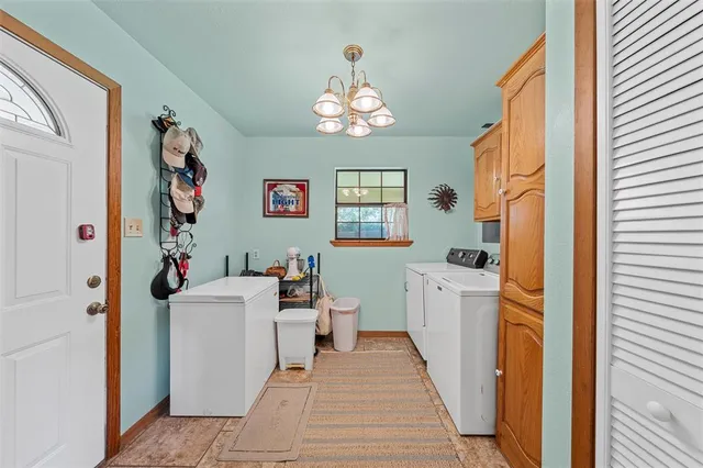 a bathroom with a sink a toilet and shower curtain