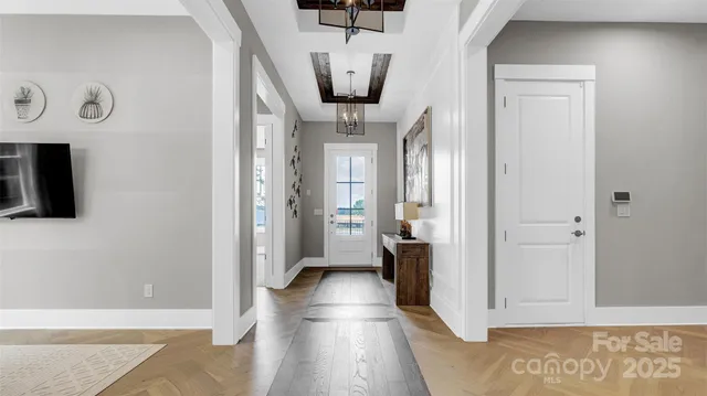 a view of a hallway with seating area