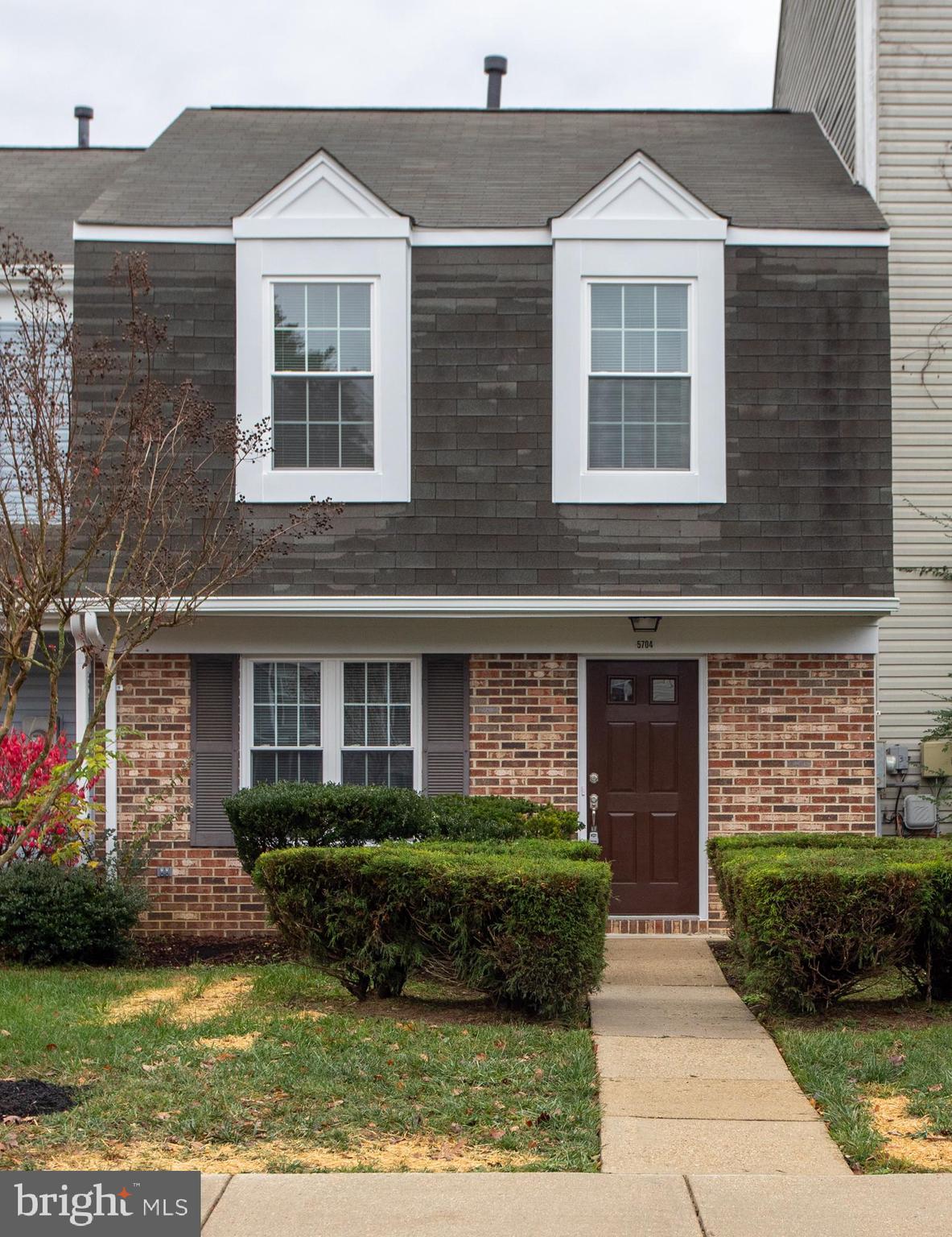 5704 Springfish Place Waldorf, MD 20603 - Photo 2 of 38 a front view of a house with a yard