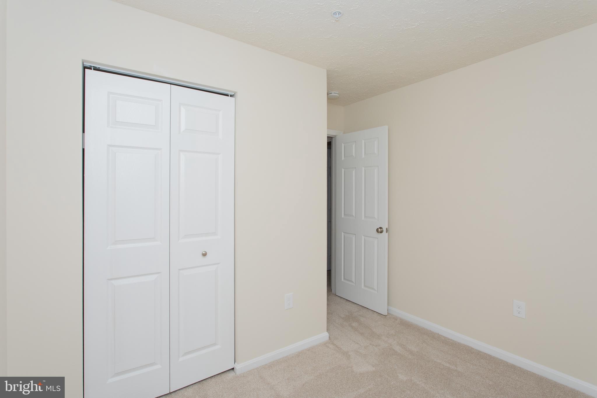 5704 Springfish Place Waldorf, MD 20603 - Photo 33 of 38 a view of an empty room